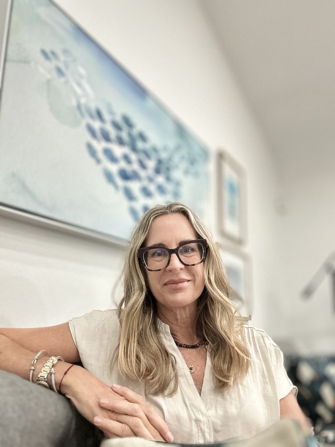 Jennifer seated in her office